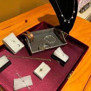 Sterling silver 16-18 adjustable necklace with dangles.